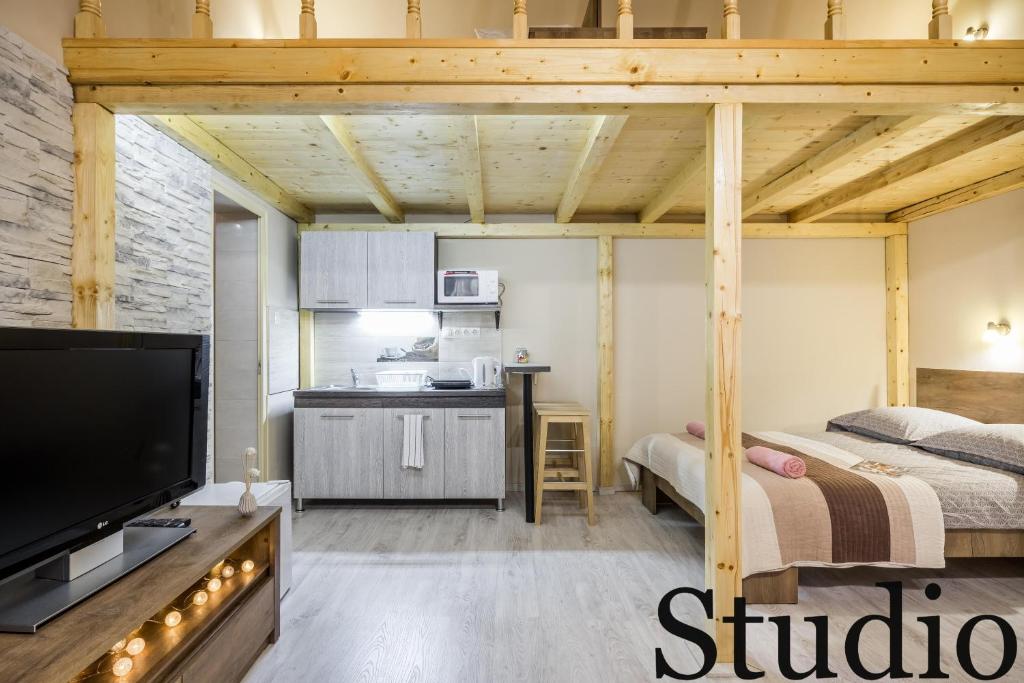 Posteľ alebo postele v izbe v ubytovaní BpR Luminous Design Apartments