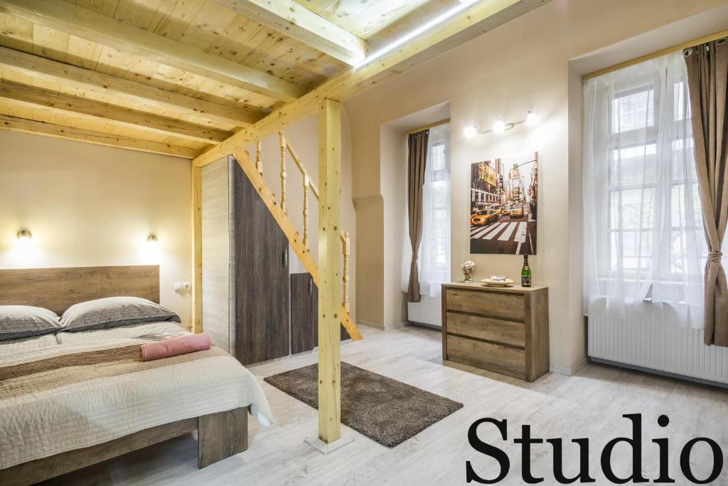 Posteľ alebo postele v izbe v ubytovaní BpR Luminous Design Apartments