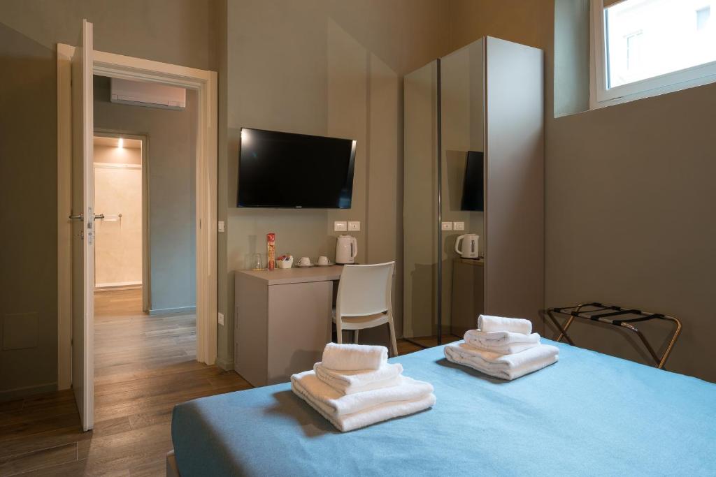 TV a/nebo společenská místnost v ubytování GOGO` Petit Hotel