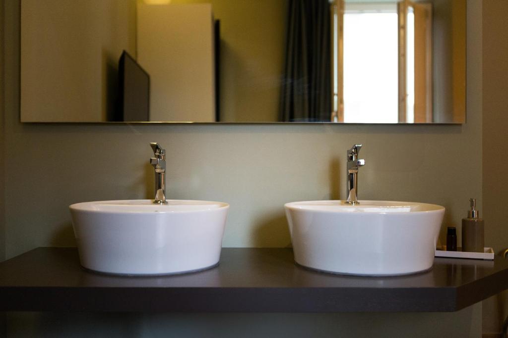 Koupelna v ubytování GOGO` Petit Hotel