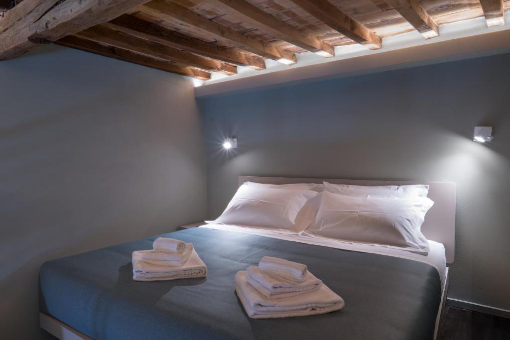 Postel nebo postele na pokoji v ubytování GOGO` Petit Hotel