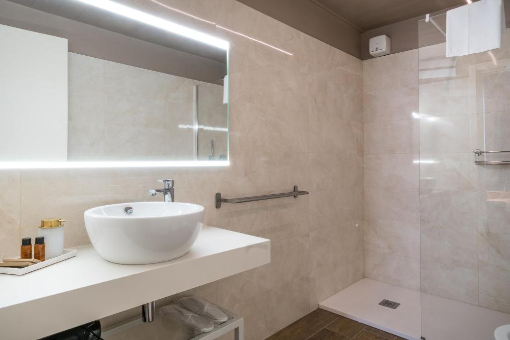 Koupelna v ubytování GOGO` Petit Hotel