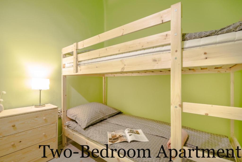 Posteľ alebo postele v izbe v ubytovaní BpR Luminous Design Apartments