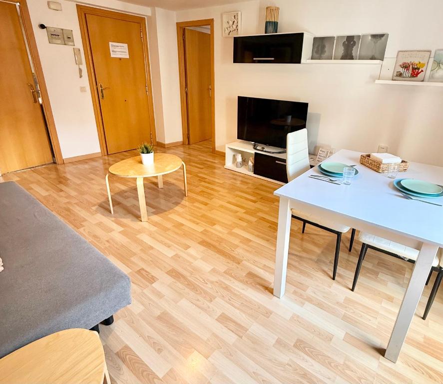 TV a/nebo společenská místnost v ubytování Apartamento Ramon Pignatelli
