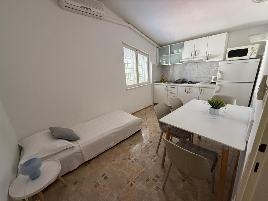 Kuchyň nebo kuchyňský kout v ubytování Apartments Olga 2