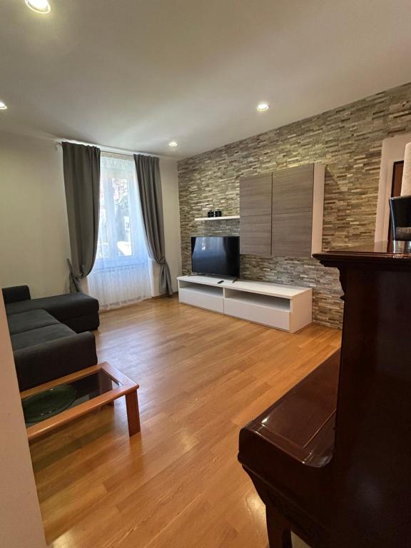 Et tv og/eller underholdning på Appartamento Alba