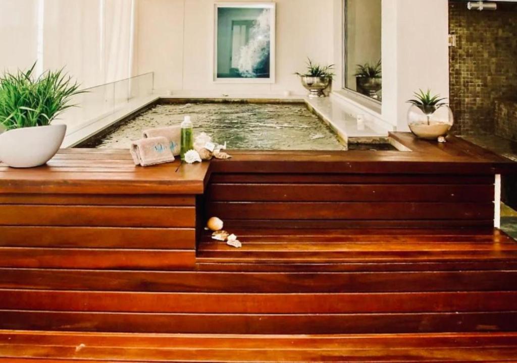 a pool in the middle of a house at Cosy Urban Apartment in Durban