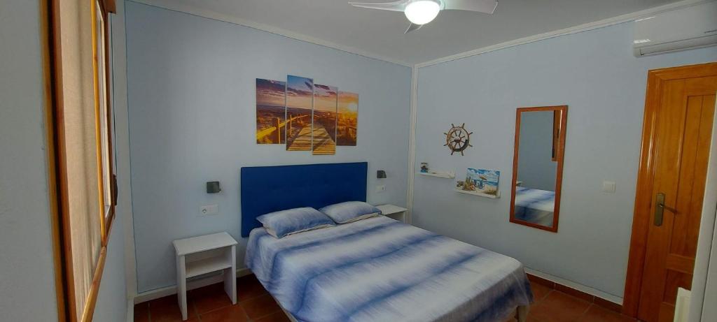 Postel nebo postele na pokoji v ubytování Cortijo Blanco