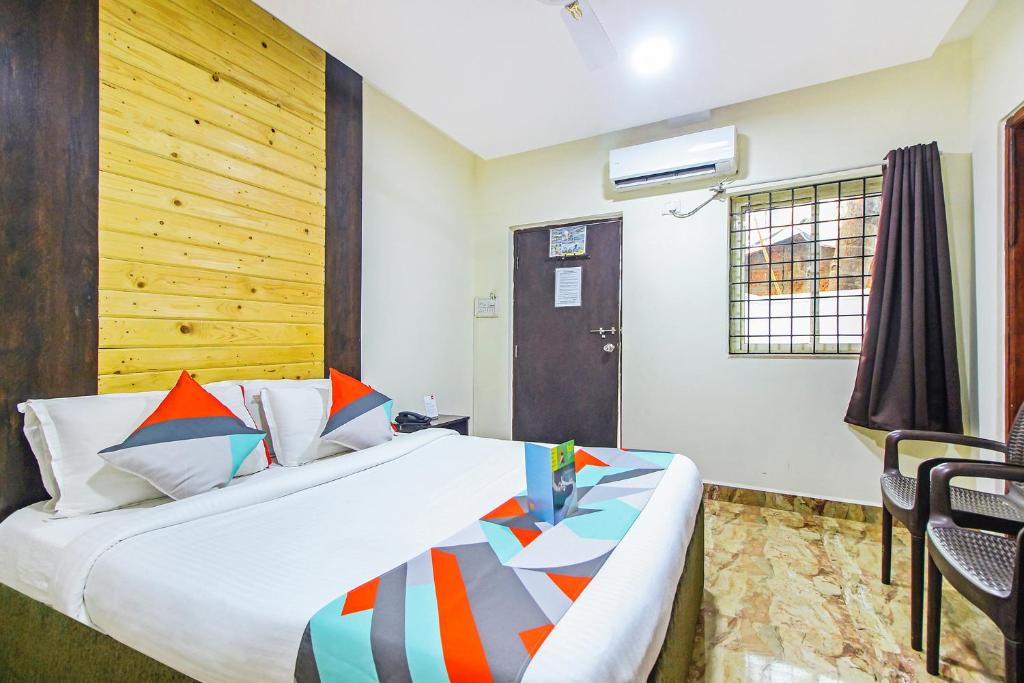 Postel nebo postele na pokoji v ubytování FabHotel Golden Nest Deluxe - Nr Calangute Beach