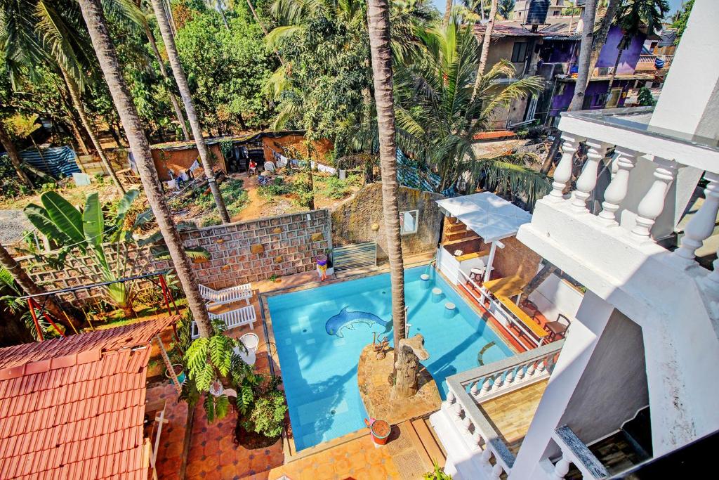 Bazén v ubytování FabHotel Golden Nest Deluxe - Nr Calangute Beach nebo v jeho okolí