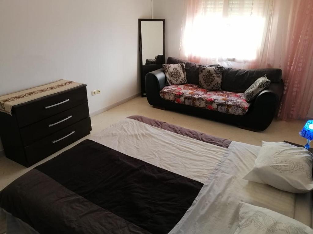 Postel nebo postele na pokoji v ubytování IMAVAC Appartements