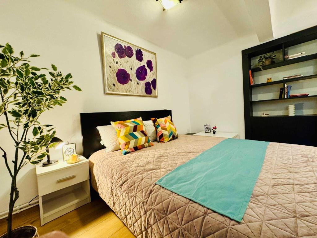 En eller flere senge i et værelse på Joy City Stay Nemoianu 8D