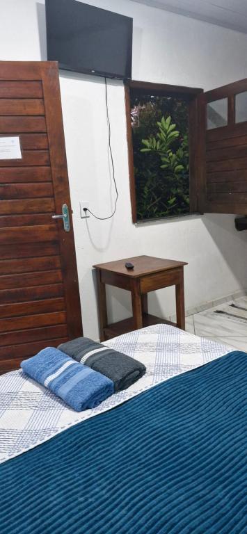 Postel nebo postele na pokoji v ubytování Cores de Boipeba