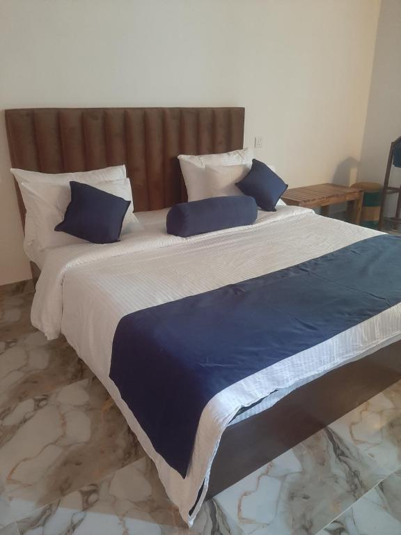 Postel nebo postele na pokoji v ubytování Welcome Homestay