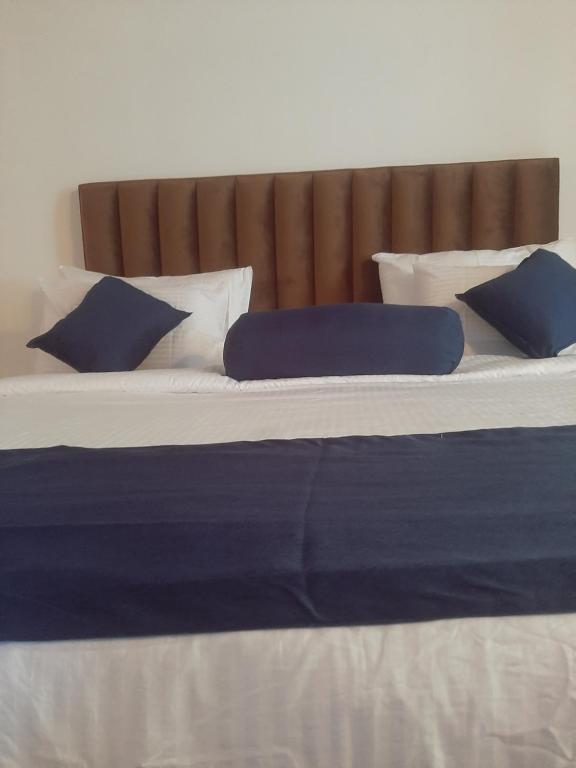 Postel nebo postele na pokoji v ubytování Welcome Homestay