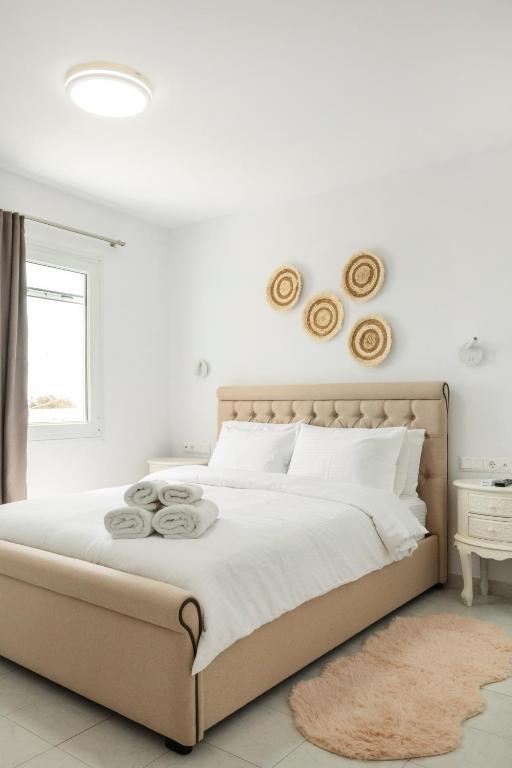 Postel nebo postele na pokoji v ubytování Mykonos Eight