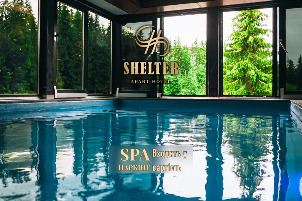 Bazén v ubytování Shelter Apart Hotel nebo v jeho okolí