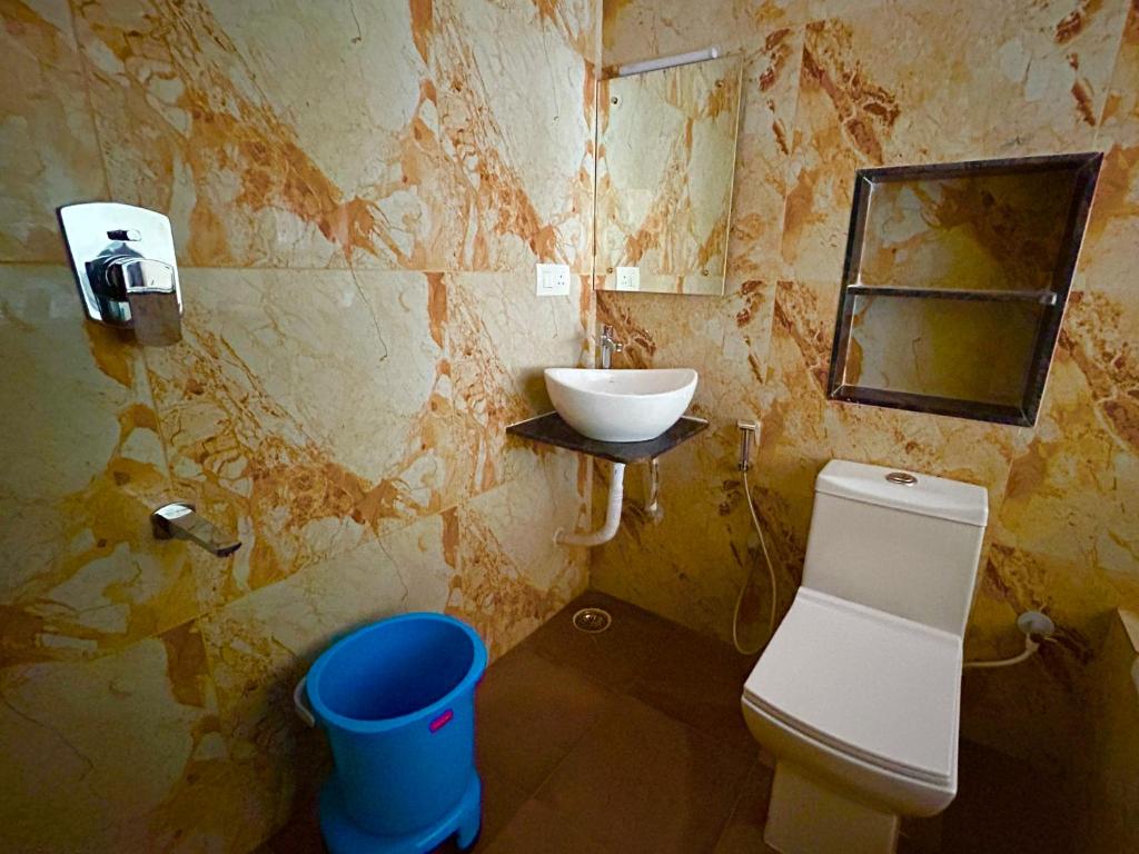 Koupelna v ubytování Nature View Resort Yercaud