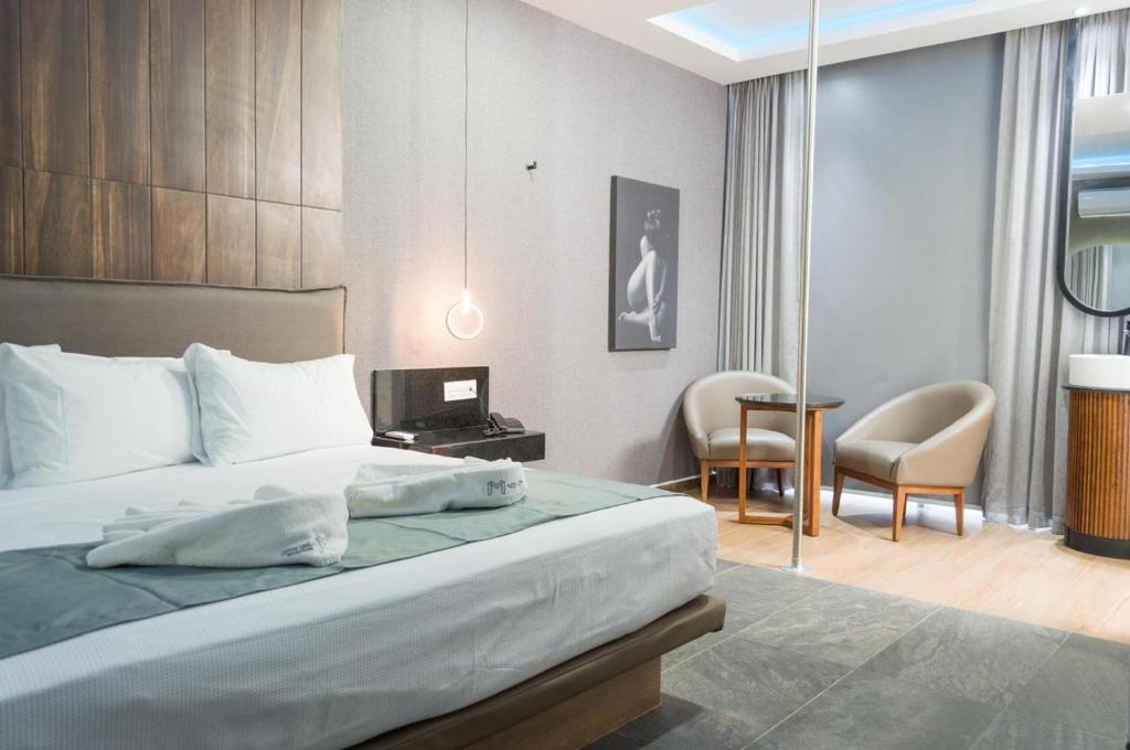 Postel nebo postele na pokoji v ubytování Motel Millenium