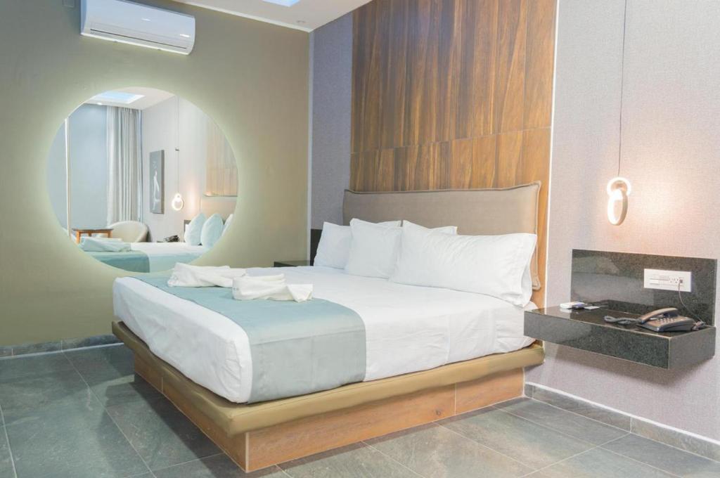 Postel nebo postele na pokoji v ubytování Motel Millenium