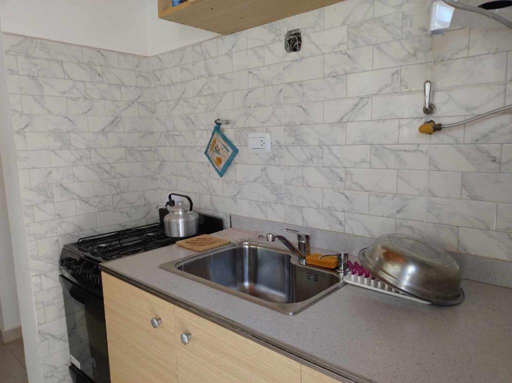 Η κουζίνα ή μικρή κουζίνα στο Casa de Gaiman Pilipala