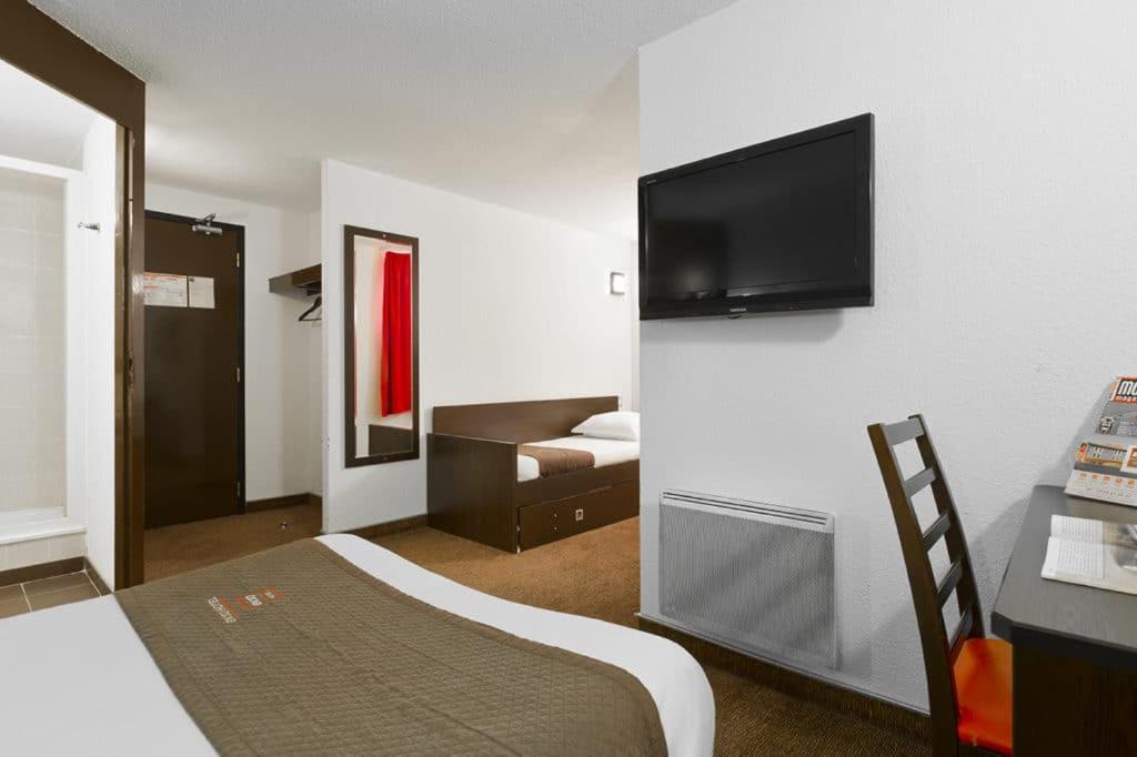Postel nebo postele na pokoji v ubytování Enzo Hotels PONT-A-MOUSSON