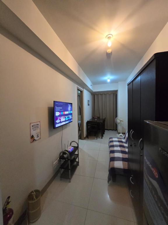 TV a/nebo společenská místnost v ubytování Sojourn in S Residences