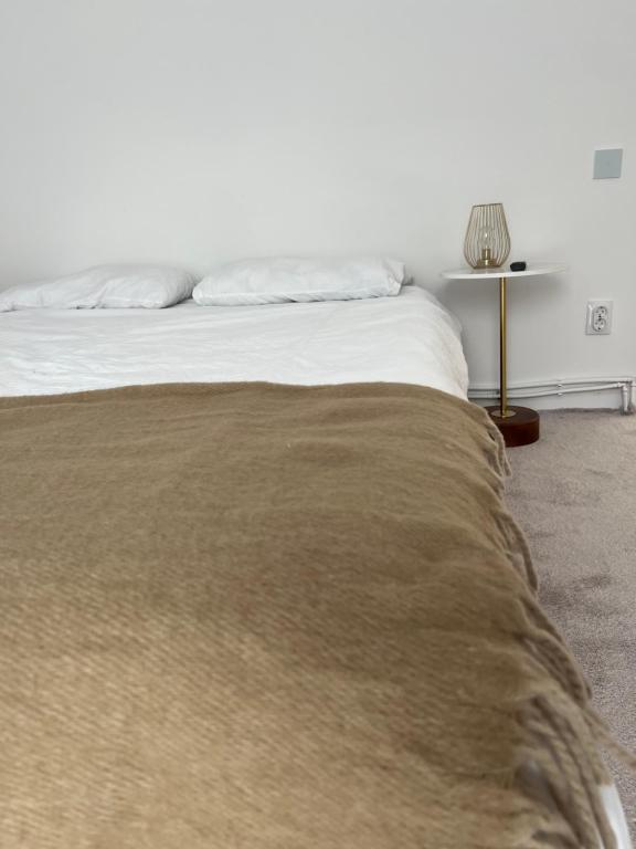 Postel nebo postele na pokoji v ubytování LaLa HOME