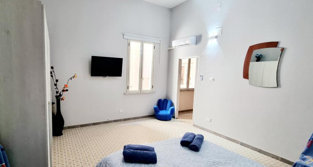 A television and/or entertainment centre at Eracles House near Ortigia Island