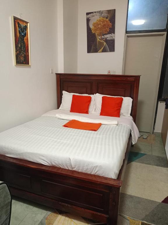 Postel nebo postele na pokoji v ubytování Tsavo Apartments