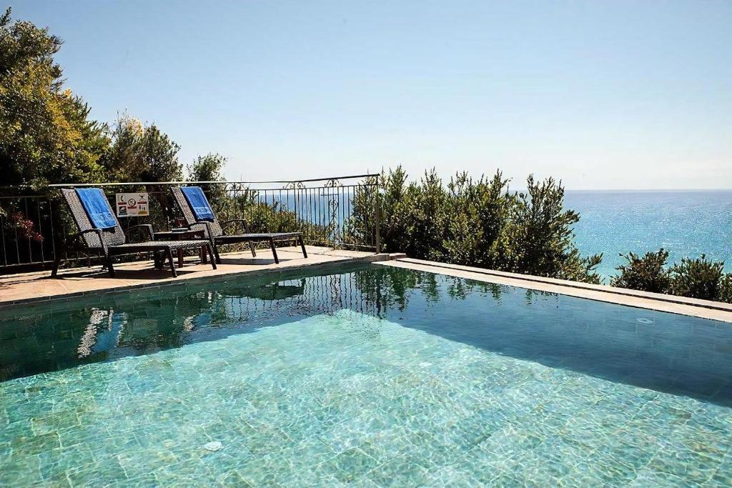 Fotografia z galérie ubytovania Unique Kefalonia Villa 2 Bedrooms Villa Kalou Cottage Breath Taking Sea Views Lourdas v destinácii Kefallonia