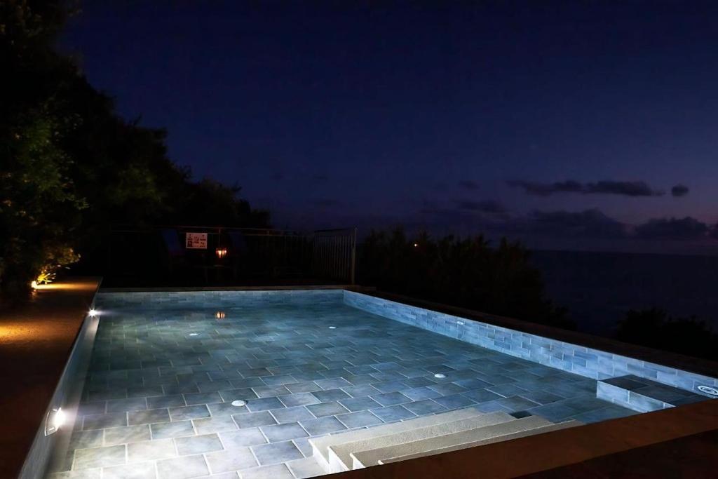 Fotografia z galérie ubytovania Unique Kefalonia Villa 2 Bedrooms Villa Kalou Cottage Breath Taking Sea Views Lourdas v destinácii Kefallonia