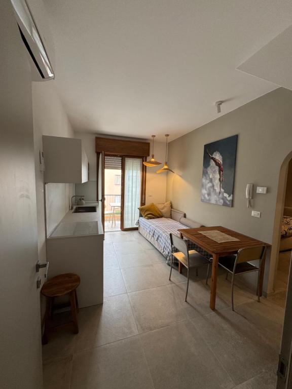 Postel nebo postele na pokoji v ubytování Sweet Village Apartment