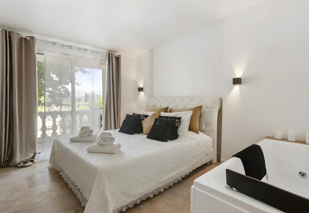 Ένα ή περισσότερα κρεβάτια σε δωμάτιο στο La Suite Love