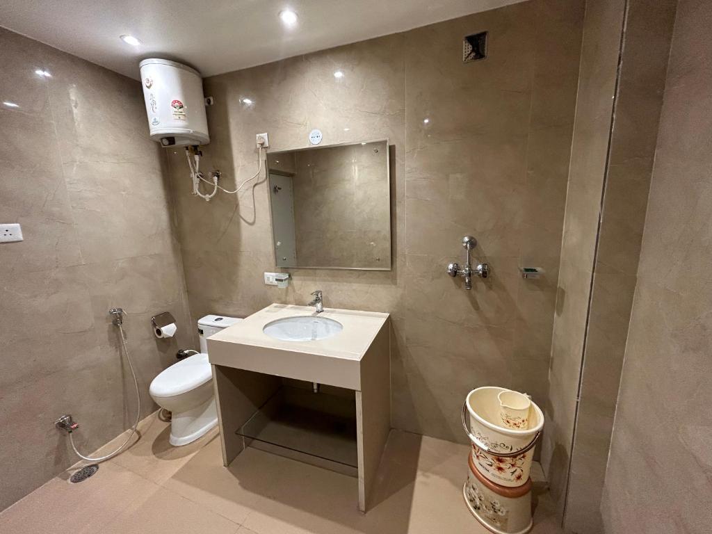 Koupelna v ubytování Hotel President
