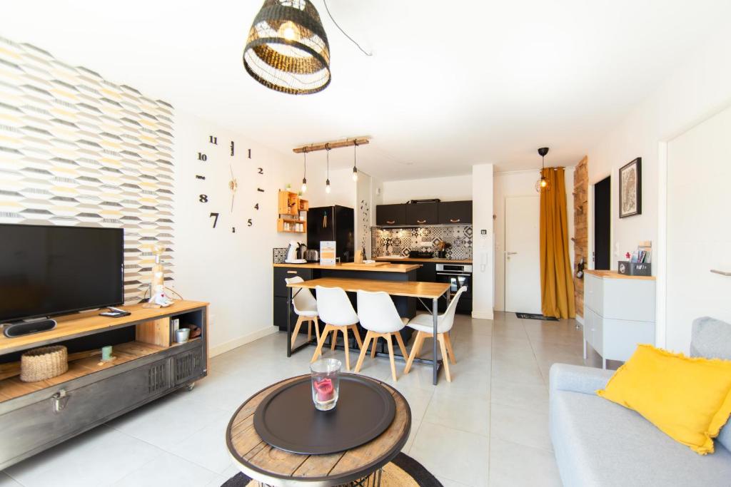 Η κουζίνα ή μικρή κουζίνα στο APPARTEMENT CHRISTINE à Lège