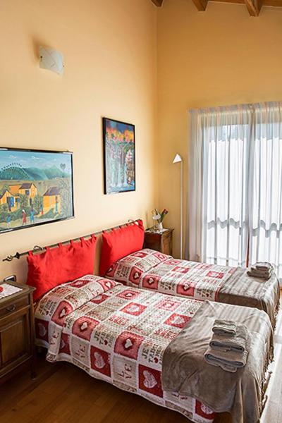 Postel nebo postele na pokoji v ubytování B&B Rubino