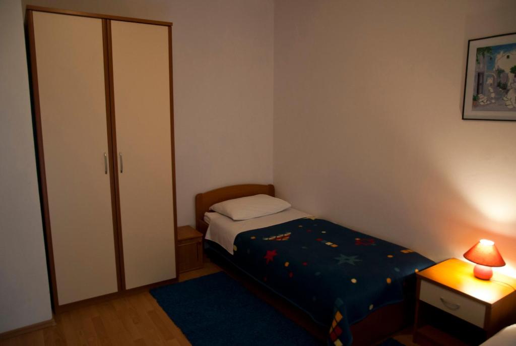 Postel nebo postele na pokoji v ubytování Hotel Metković
