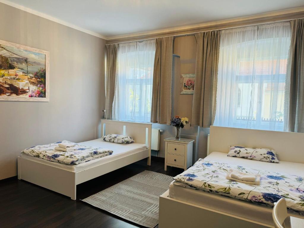 Postel nebo postele na pokoji v ubytování Apartments Oschatz