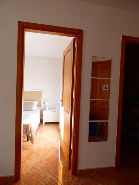 Postel nebo postele na pokoji v ubytování VV El Picón