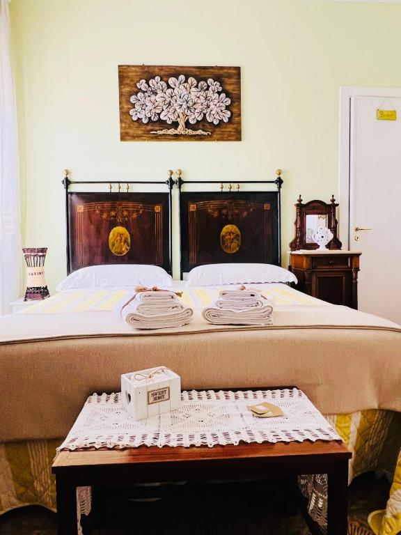 Postel nebo postele na pokoji v ubytování B&B DOÑA FLOR