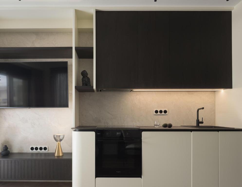 Kuchyň nebo kuchyňský kout v ubytování Allegro Suites
