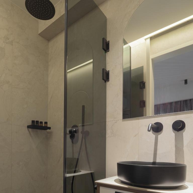 Koupelna v ubytování Allegro Suites