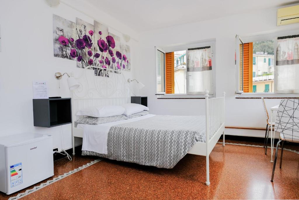 Postel nebo postele na pokoji v ubytování Hotel Caffaro