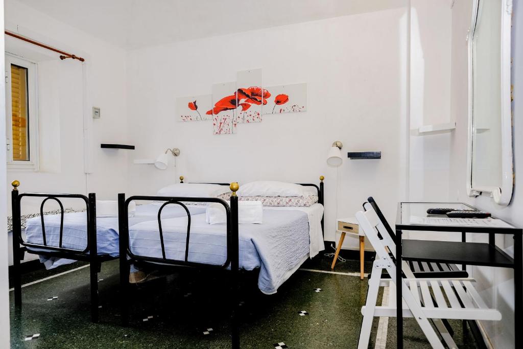 Postel nebo postele na pokoji v ubytování Hotel Caffaro