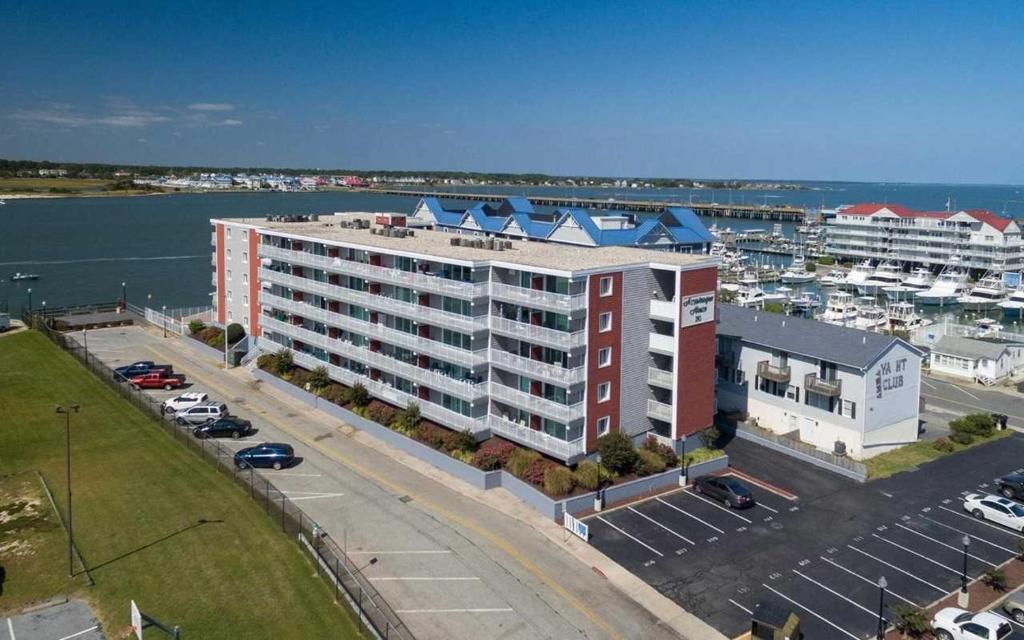 an aerial view of a large building with a parking lot at 210 Worchester St #405 in Ocean City