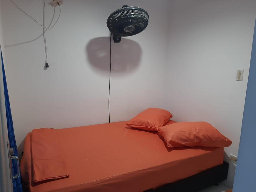Postel nebo postele na pokoji v ubytování Hotel Los Delfines Melgar