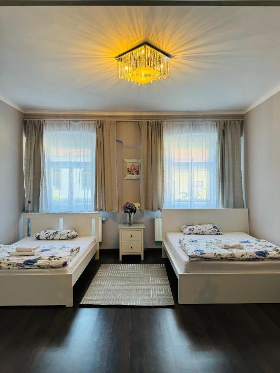 Postel nebo postele na pokoji v ubytování Apartments Oschatz