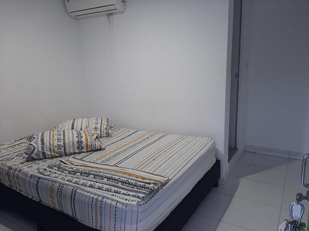 Postel nebo postele na pokoji v ubytování Hotel Los Delfines Melgar