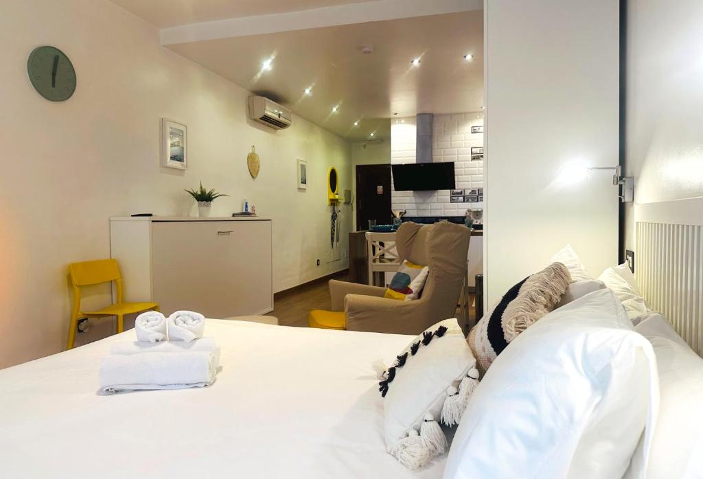 เตียงในห้องที่ Urban Flat Class